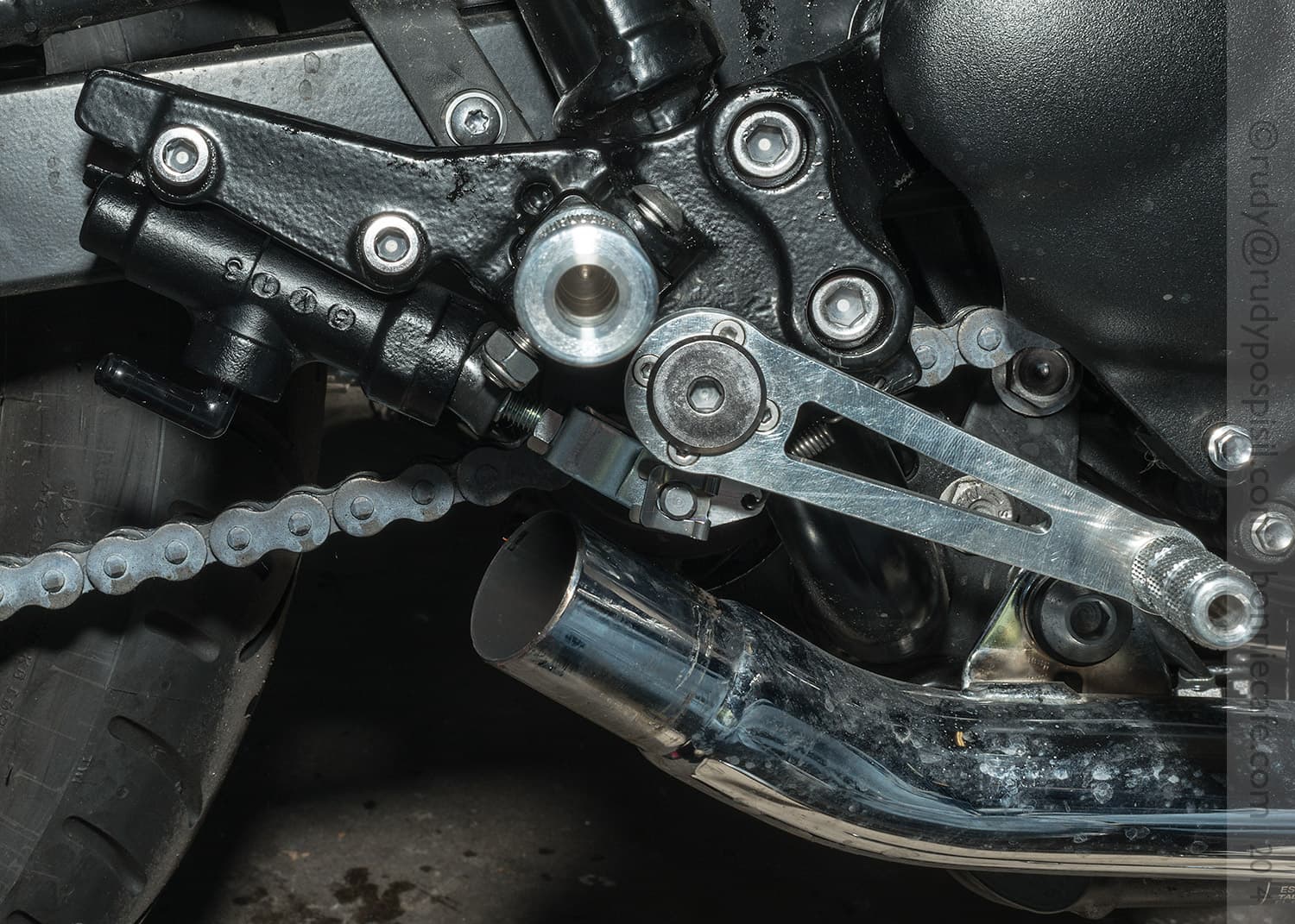 Right side silencer removed from a Triumph Bonneville T100. Bonnie Cafe.